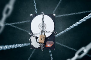 technology wrapped in chains with a lock